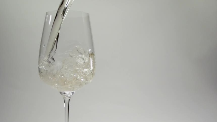 Liquid is poured into a glass