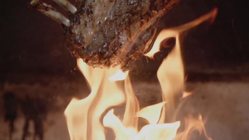 Meat is cooked on a grill