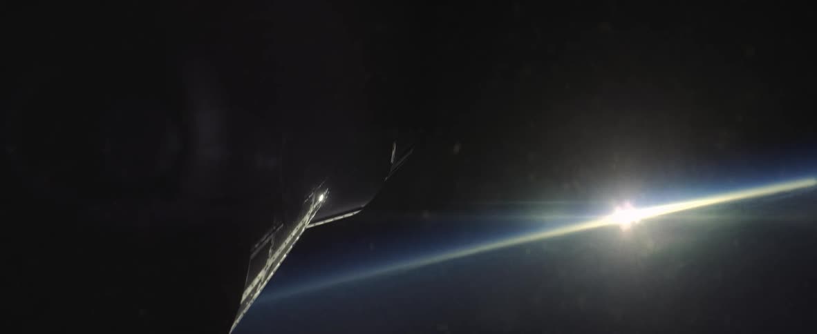 View from the space station of the sun rising over the atmosphere of earth