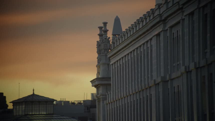 The sun is nearly sit over the city