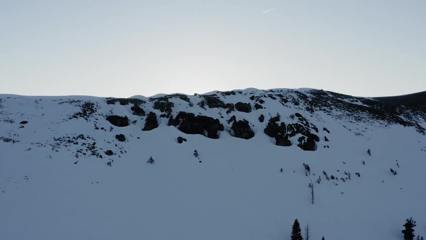 The mountain is covered with snow