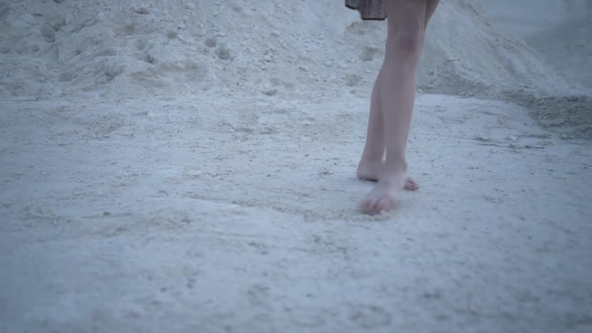 Girl jumps and dances on dirt