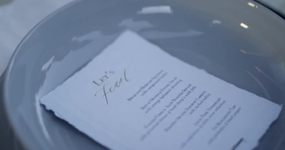 A menu is displayed inside of a plate
