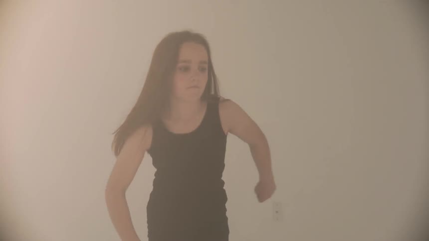 Girl dances in a studio