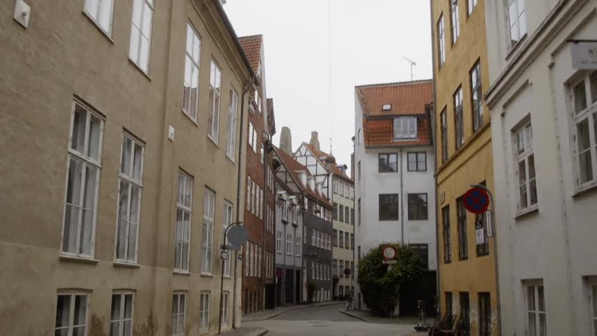 The neighborhood street is empty