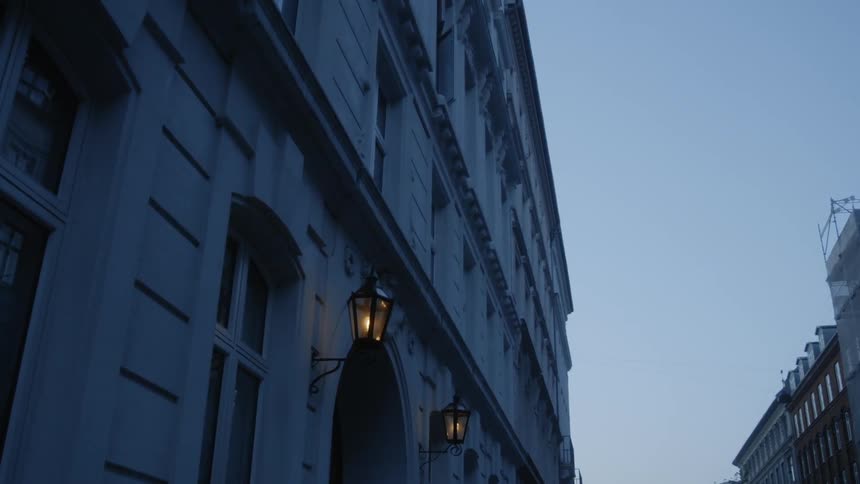 The sun is nearly set on this city street