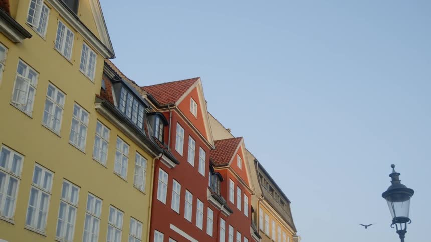 Brightly colored row houses on a sunny day
