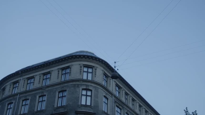 Wires over head of a large apartment building