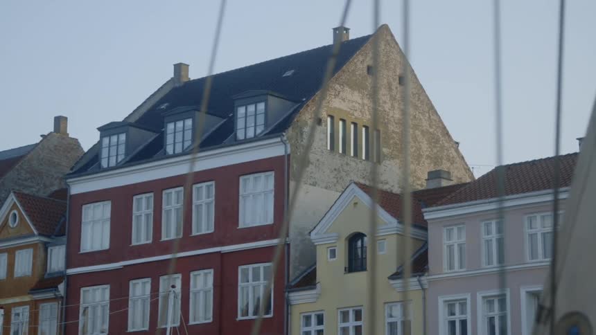 The building has many windows on a sunny day