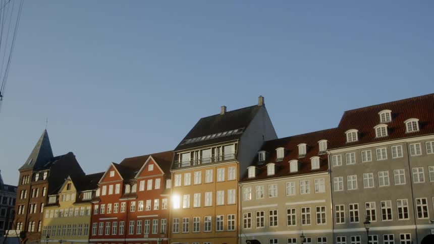 Sunlight reflects off a city building