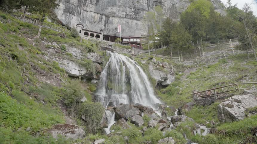 There is a building at the top of the waterfall