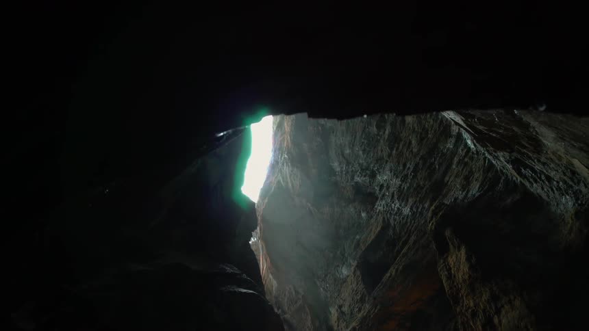 A large rocky cavern on a bright day