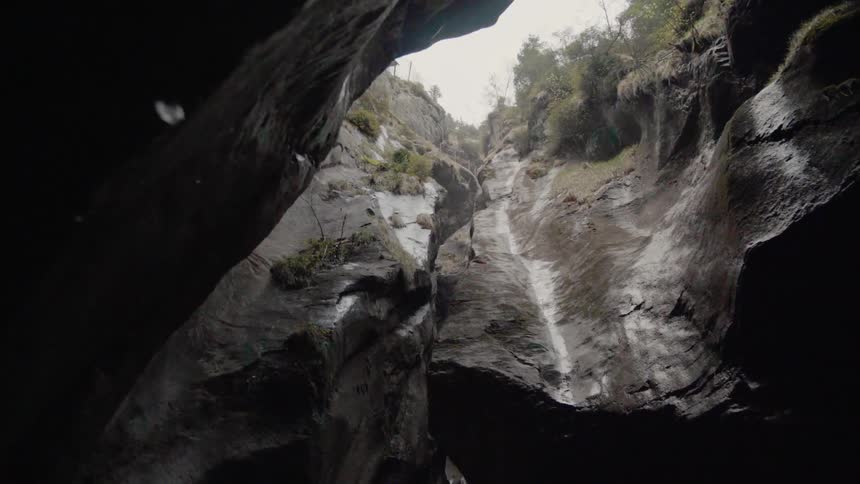 Water drips down into a canyon