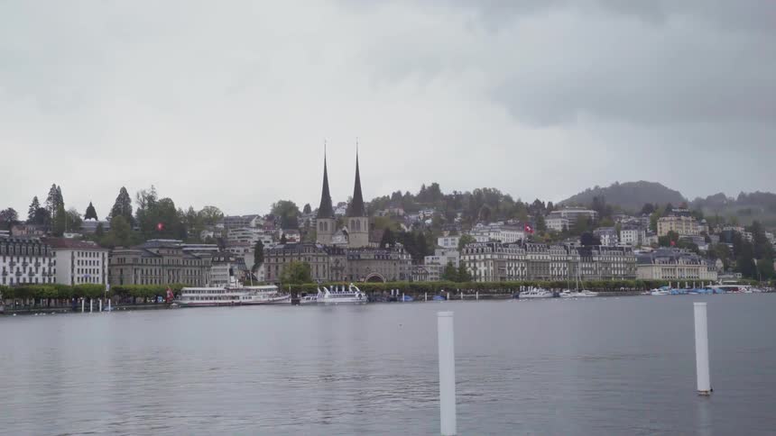 The water is calm near the city