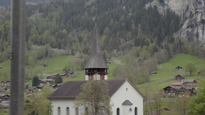 A church stands in a mountain village
