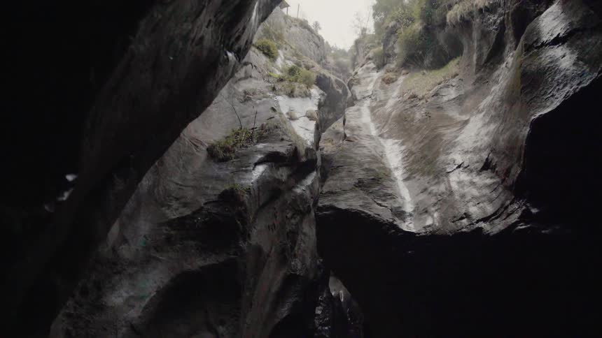 Water falls down into the cavern