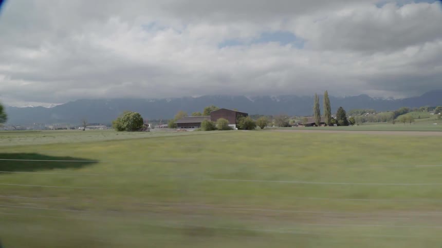 The farmland is vast on a cloudy day