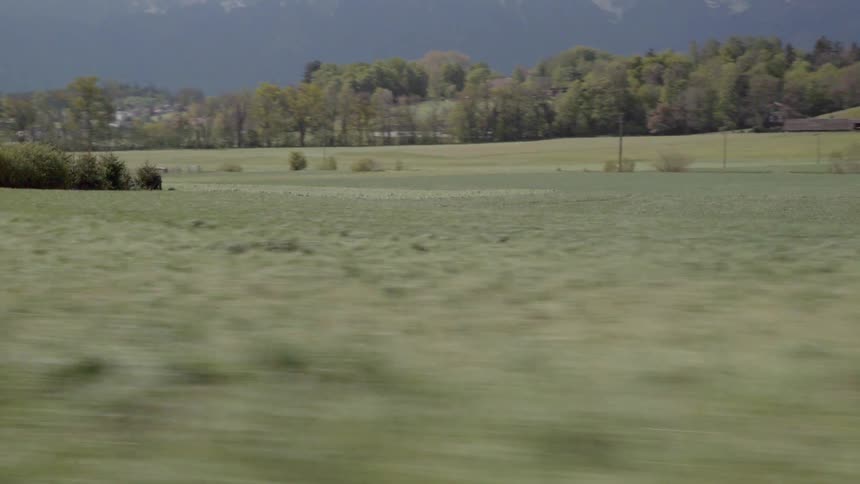 A car travels on a rural road
