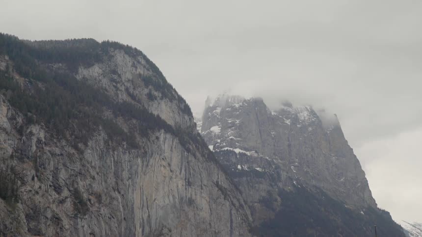 The fog is covering the mountain top ahead