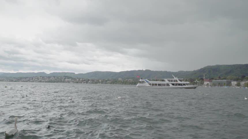A ship floats on a lake