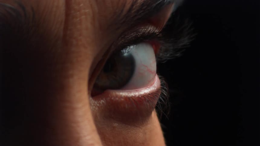 A person's eye looks all around
