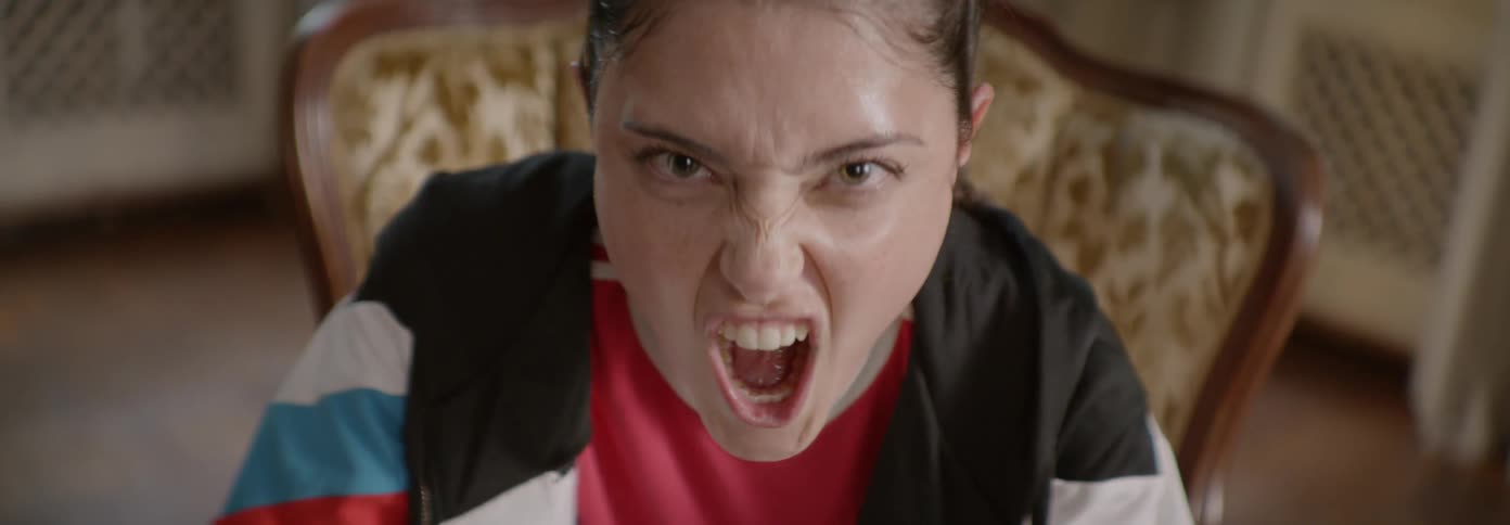Woman looks up and starts yelling