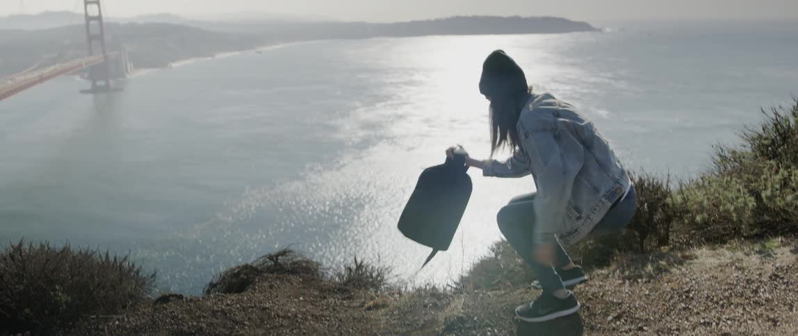 Woman hikes near the golden gate bridge