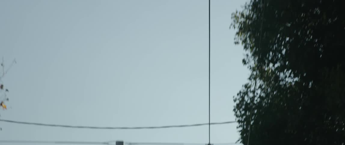 Power lines hang above the road