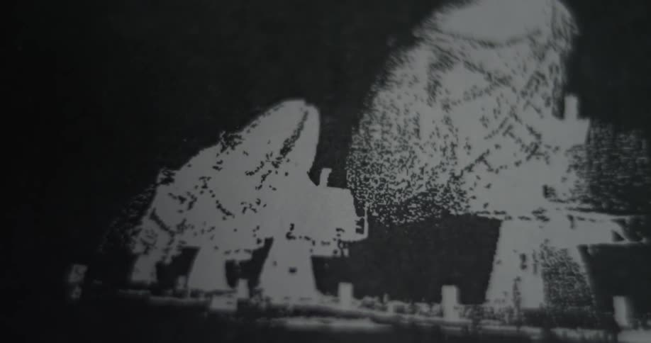 Closeup of an old newspaper picture and caption