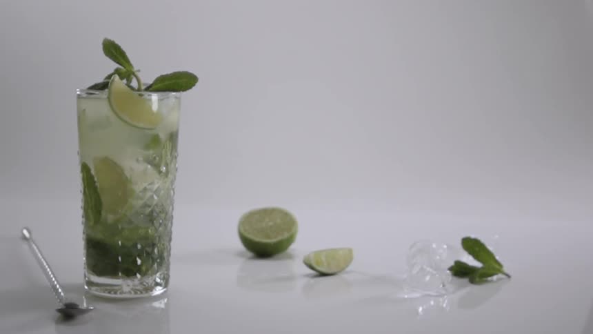 The drink with lime gets a splash of garnish