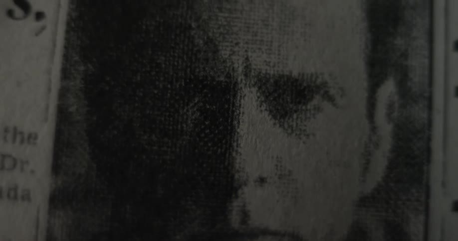 Close up of a man's portrait in a newspaper