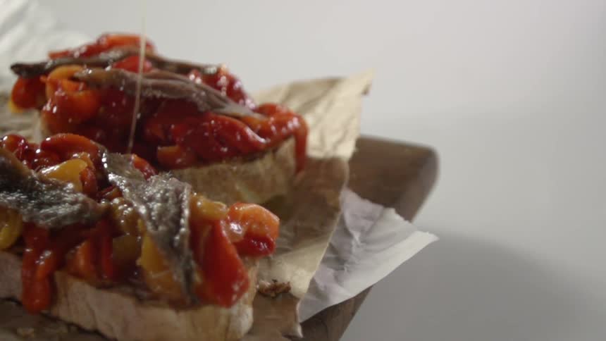 Oil is drizzled on a sandwich