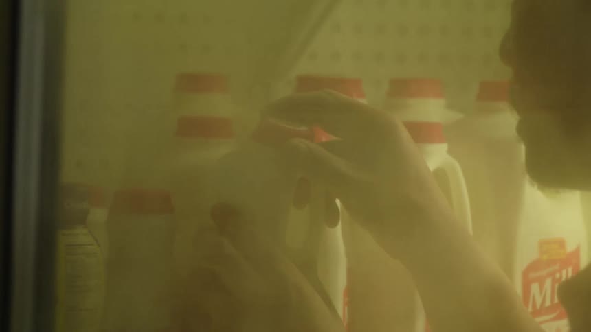 A man shops for milk