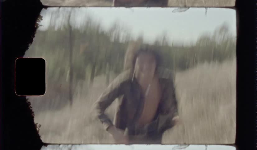 A man stands up and runs