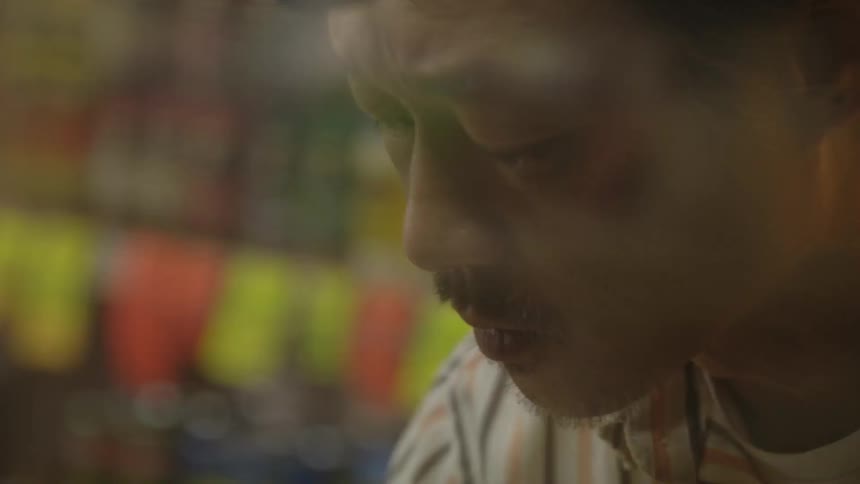 A man is working in the store