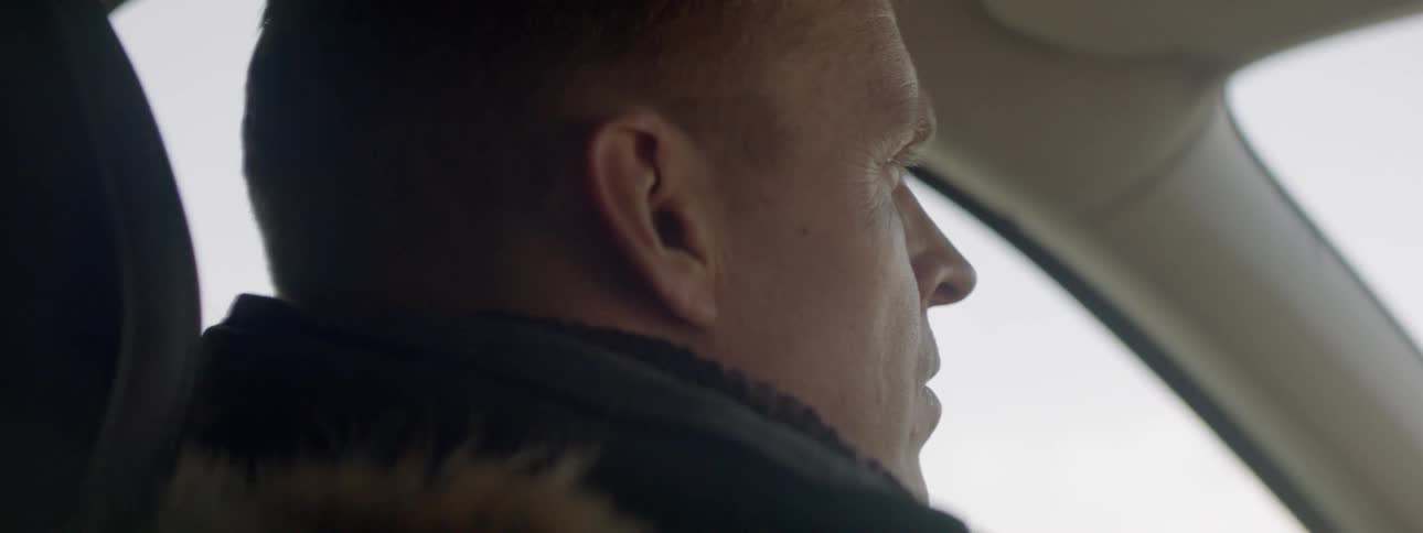 Man drives a vehicle as he blinks his eyes
