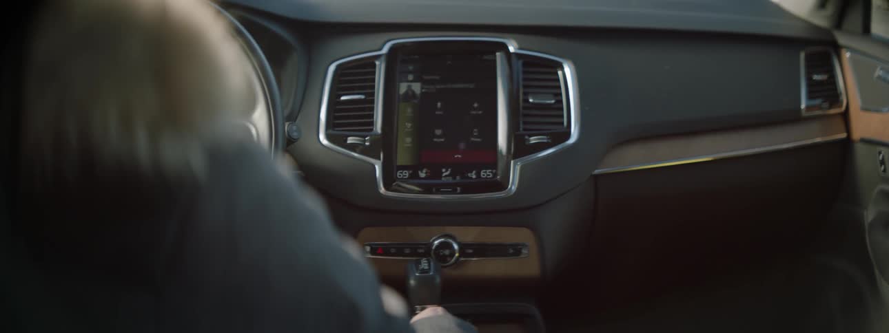 A man sits in a car
