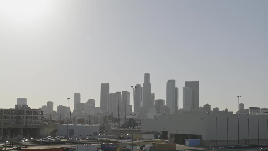 Tall city buildings tower into the skyline