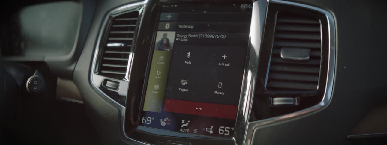 Car stereo plays a song on its monitor