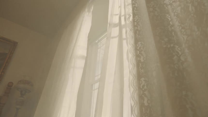 The light flashes through the windows
