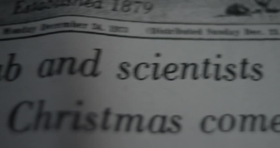 Close up of the headline of a vintage printed newspaper
