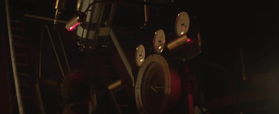 Man checking a large piece of equipment