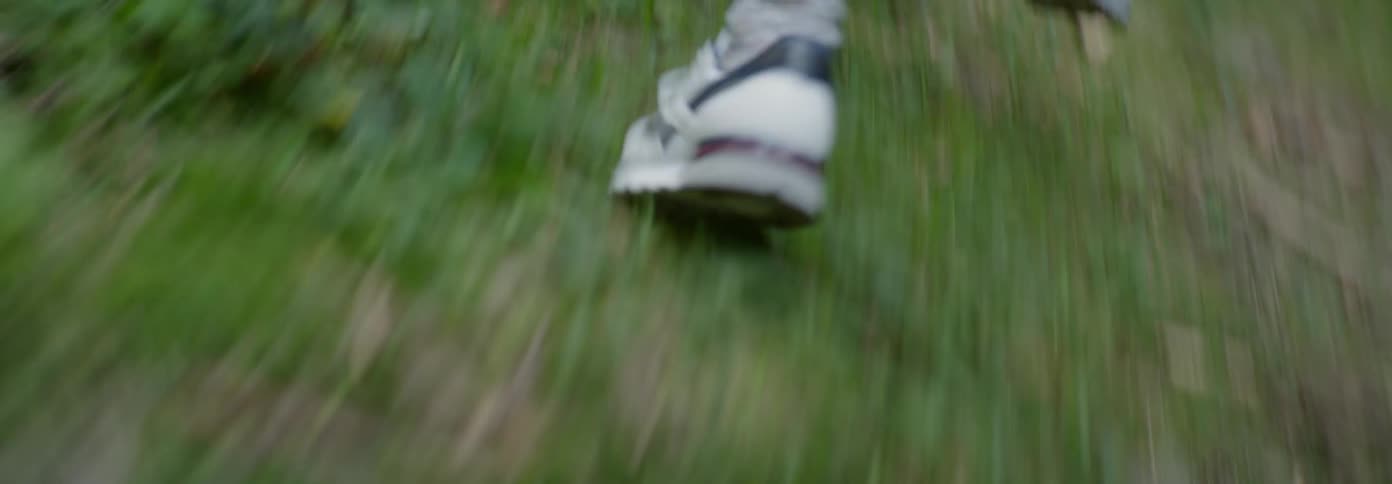 Woman runs in a forest