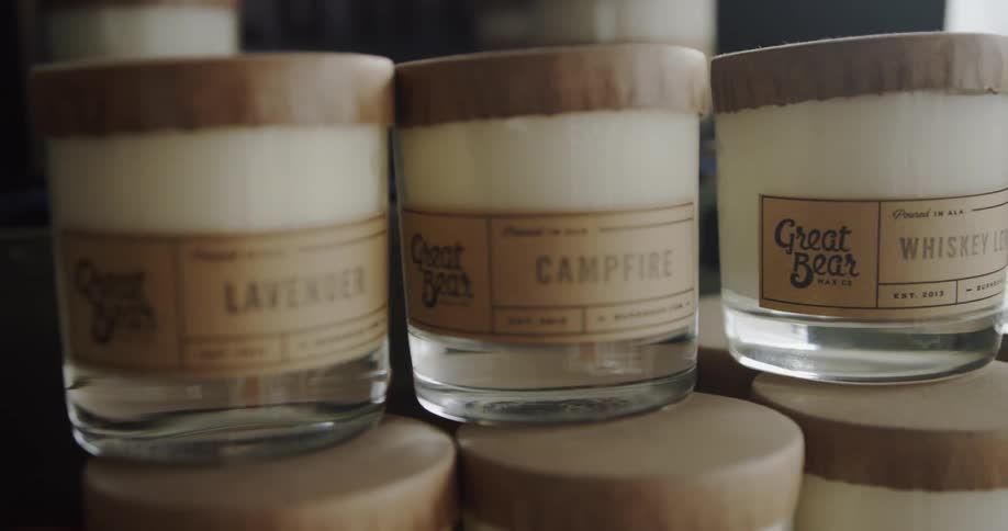 The small jars are stacked on the table