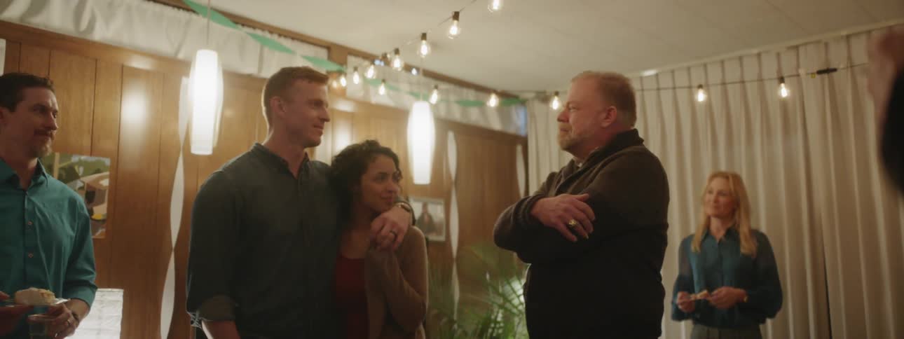 People talk at a house party