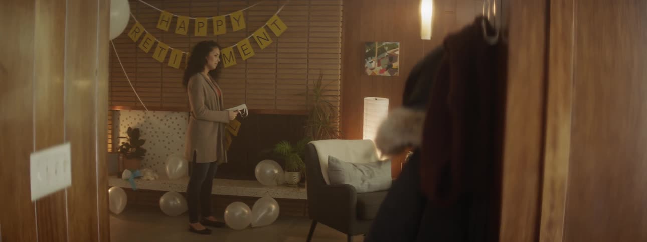 Woman decorates for a retirement party