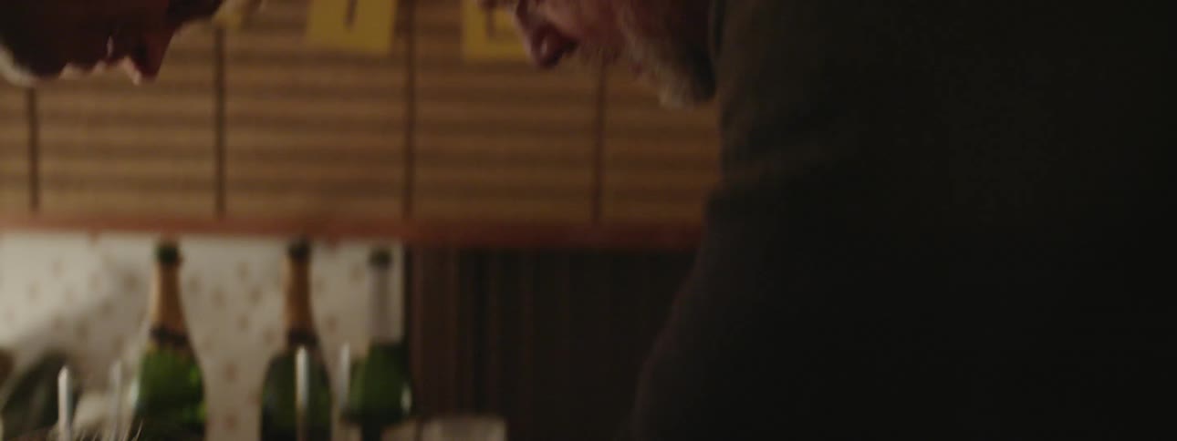 A man cuts the cake at a party