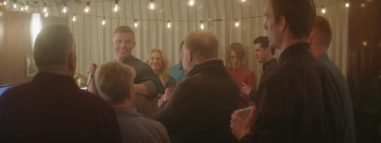 A man gives a speech at a gathering