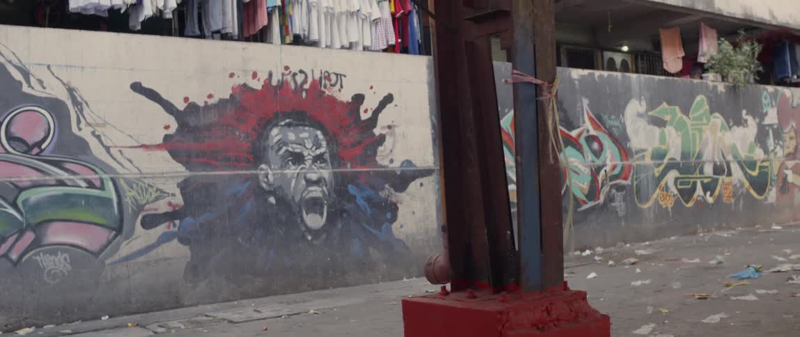 The wall has many paintings on it