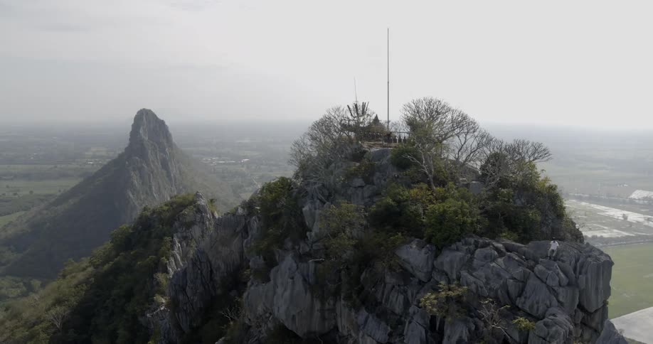 The mountain has a house at the top